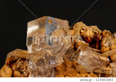 Macro stone mineral Fluorite on a black background 115661663