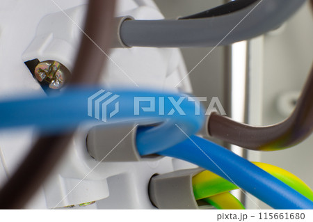 Close-up of Electric Cables, Concept Electrical Connections and Repairs. Close-up of Electric Cables, Concept Electrical Connections and Repairs. 115661680