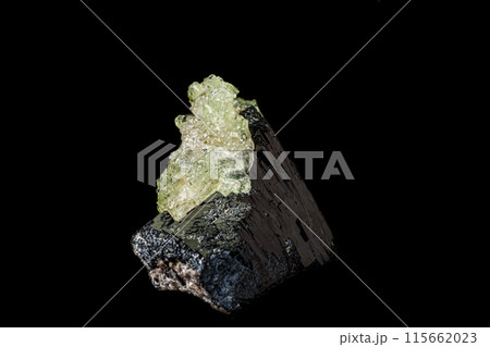 Macro stone Hyalite mineral, tourmaline Sherl, smoky quartz on a black background 115662023