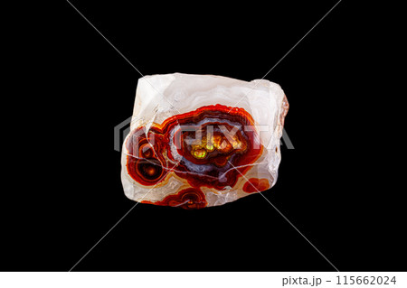 macro mineral stone fire agate on a black background macro mineral stone fire agate on a black background 115662024