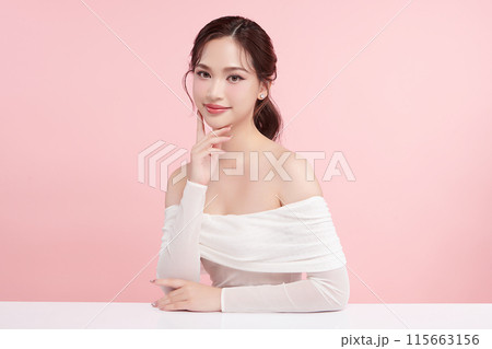 Beautiful young asian woman with clean fresh skin on pink background, Face care, Facial treatment, Cosmetology, beauty and spa, Asian women portrait. 115663156