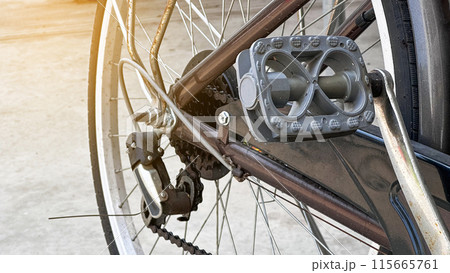 Close up parts of traditional dark brown bicycle Close up parts of traditional dark brown bicycle 115665761