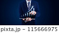 Businessman in a suit using a tablet with a digital bar chart showing growth. Concepts of business, finance, investment, profit, and development in a corporate setting 115666975