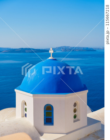 Traditional blue dome-shaped roof in the village of Oia, Santorini, Greece. Traditional blue dome-shaped roof in the village of Oia, Santorini, Greece. 115667218