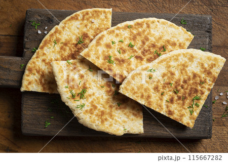 Pita bread, flatbread, naan 115667282