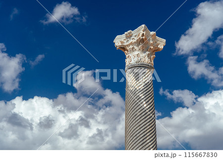 Ancient column against blue sky at Kourion archaeological site. Limassol District, Cyprus Ancient column against blue sky at Kourion archaeological site. Limassol District, Cyprus 115667830