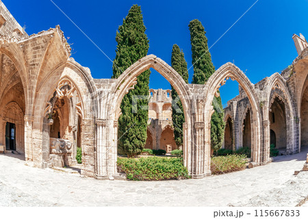 Panoramic view of medieval Bellapais monastery ruins. Kyrenia District, Cyprus 115667833