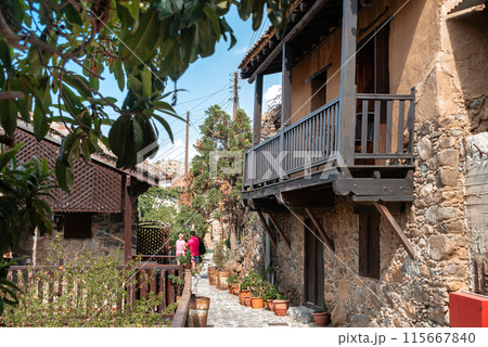 Traditional stone houses with wooden balconies at Kakopetria village. Nicosia District, Cyprus 115667840