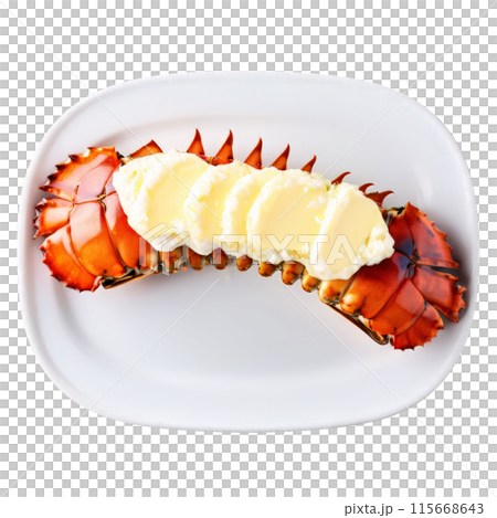 Broiled lobster tail split open garnished with drawn butter shot from above Food and culinary 115668643
