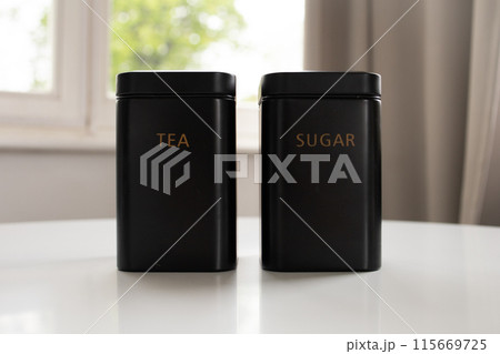 Tea and shugar containers on the table Tea and shugar containers on the table 115669725
