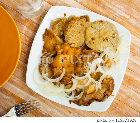 Pickled russula delica with onions 115673929