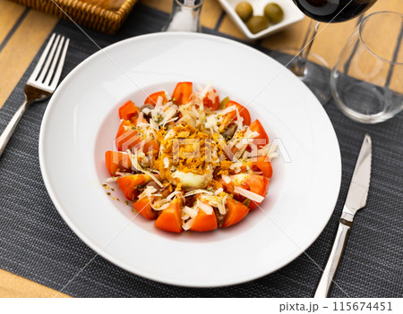 Vegetable salad with stuffed egg halves closeup 115674451