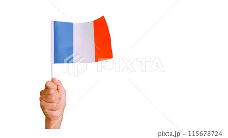 Wind waving a french pennant holding by a person Wind waving a french pennant holding by a person 115678724