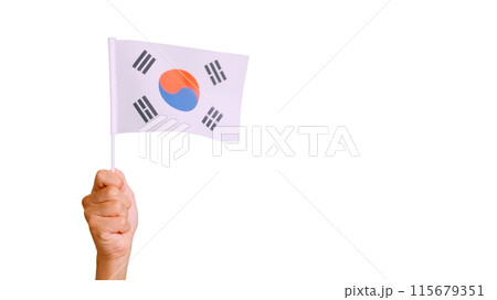 Wind waving a south korean pennant holding by a hand Wind waving a south korean pennant holding by a hand 115679351