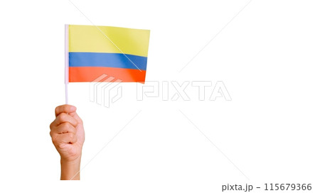 Wind waving a colombian pennant holding by a hand 115679366