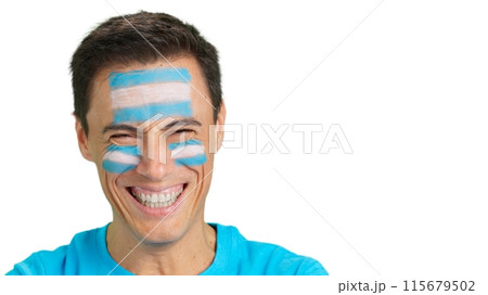 Man with a argentine flag painted on the face smiling 115679502