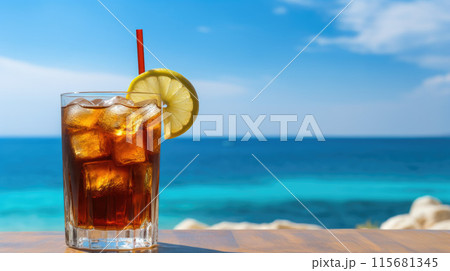Summer cocktails, sea resort concept. Glass of iced tea. Long island cocktail on tropical beach 115681345