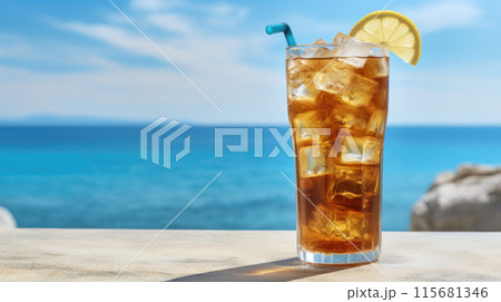 Summer cocktails, sea resort concept. Glass of iced tea. Long island cocktail on tropical beach 115681346