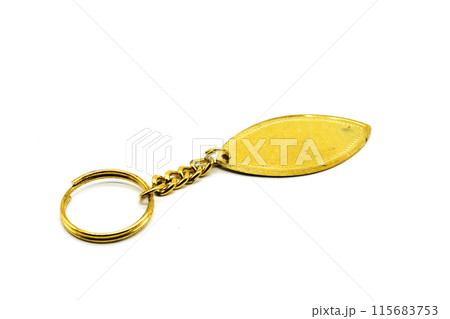 A picture of golden earrings with white background 115683753