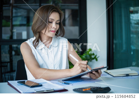 asian business woman working in office asian business woman working in office 115684852