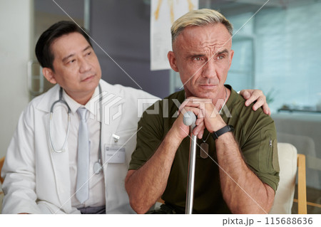 Soldier With Cane Getting Disability Soldier With Cane Getting Disability 115688636