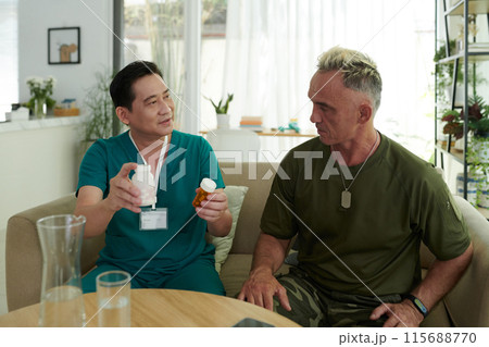 Doctor Prescribing Medicine to Officer Doctor Prescribing Medicine to Officer 115688770