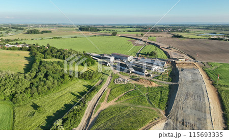 Highway destruction village in construction drone aerial Czech Prerov, agricultural land fields, remove of people houses and buildings land grabbing extension works additional lanes way new road 115693335