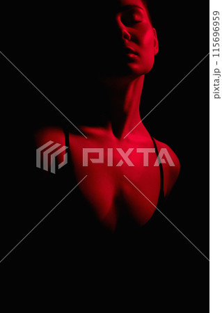 Beautiful woman in red color. sexual girl in dark. young Body Beautiful woman in red color. sexual girl in dark. young Body 115696959