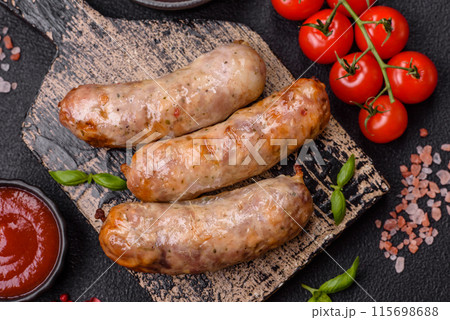 Baked chicken or pork sausages, salt, spices and herbs 115698688