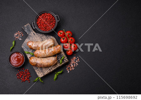 Baked chicken or pork sausages, salt, spices and herbs Baked chicken or pork sausages, salt, spices and herbs 115698692