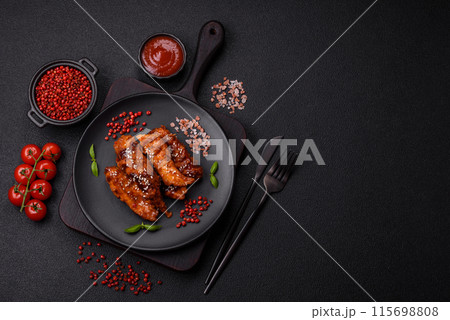 Delicious chicken fillet sliced and baked with teriyaki sauce 115698808