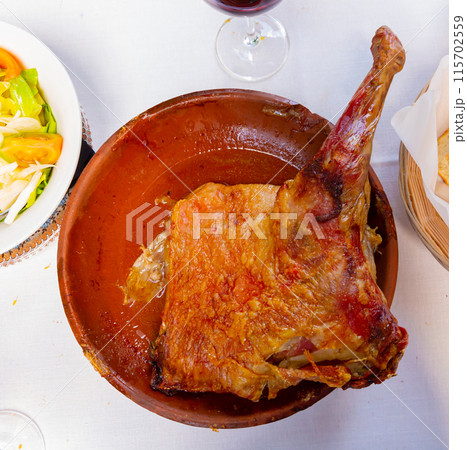 Quarter of lamb baked in oven Quarter of lamb baked in oven 115702559