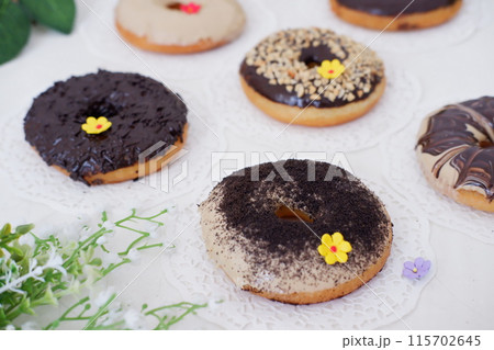donuts with delicious layers as a background donuts with delicious layers as a background 115702645