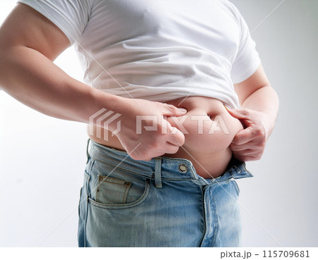 メタボリックシンドロームの男性がお腹の贅肉をつまむ,Generative AI AI画像 115709681