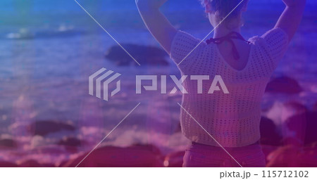 Pink square design pattern against rear view of caucasian woman standing on the rocks near the sea Pink square design pattern against rear view of caucasian woman standing on the rocks near the sea 115712102