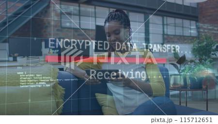 Image of data processing over african american businesswoman using tablet Image of data processing over african american businesswoman using tablet 115712651
