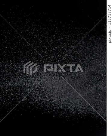 Million of black sand explosion, Photo image of falling down sands flying. Freeze shot on black background isolated overlay. Tiny Fine sand dust magnet as particle disintegrate science Million of black sand explosion, Photo image of falling down sands flying. Freeze shot on black background isolated overlay. Tiny Fine sand dust magnet as particle disintegrate science 115715714