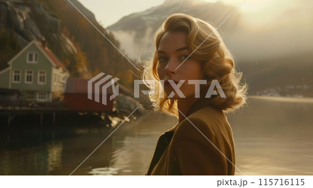 Beautiful Young Blonde Woman in 1940s Attire by Fjord in Norway Concept Romantic and Nostalgic Atmosphere with Golden Mist from Low Sun Beautiful Young Blonde Woman in 1940s Attire by Fjord in Norway Concept Romantic and Nostalgic Atmosphere with Golden Mist from Low Sun 115716115