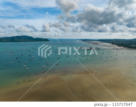 Aerial View Amazing sea with travel boats,sailing boats in the sea,Beautiful sea in summer season at Phuket island Thailand,Travel boats,Ocean during summer blue sky background 115717047