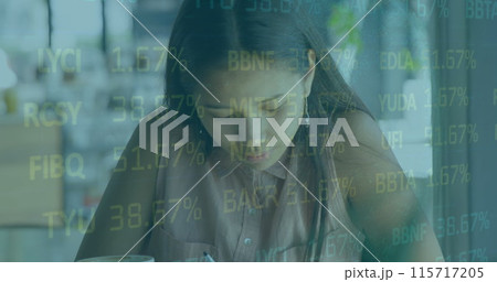 Image of financial data processing over woman making notes Image of financial data processing over woman making notes 115717205