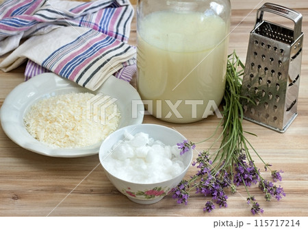 Homemade laundry detergent made from grated soap, crystalline sodium, essential oil and water.  115717214