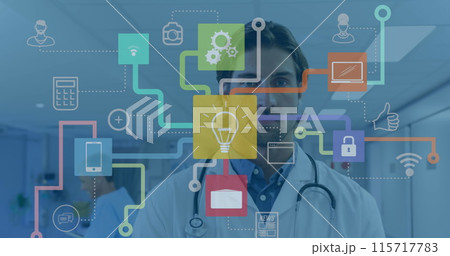Image of network of connections with icons over caucasian male doctor at hospital Image of network of connections with icons over caucasian male doctor at hospital 115717783