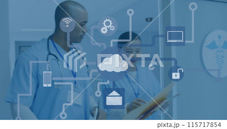 Image of network of connections with icons over diverse doctors at hospital 115717854