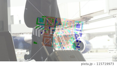 Image of a colourful QR code in a loop over biracial man carrying his suitcase, walking on an airp Image of a colourful QR code in a loop over biracial man carrying his suitcase, walking on an airp 115719973