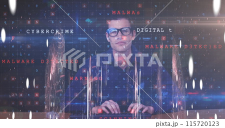 Caucasian male hacker uses laptop amidst floating shapes and data processing imagery. 115720123