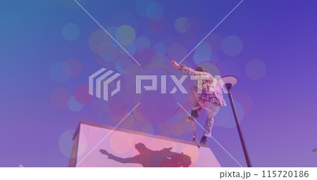 Image of colourful spots over caucasian man skateboarding 115720186