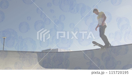 Image of bubbles over caucasian man skateboarding 115720195