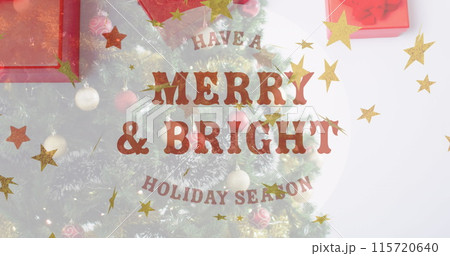This image shows a christmas tree decorated with baubles on a white background This image shows a christmas tree decorated with baubles on a white background 115720640