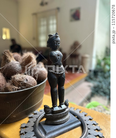 Coconut figurine in the interior of a coffee shop. Coconut figurine in the interior of a coffee shop. 115720678