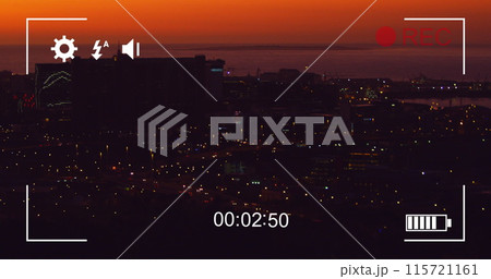 Digital camera records fast-moving night traffic and cityscape in 4k. Digital camera records fast-moving night traffic and cityscape in 4k. 115721161